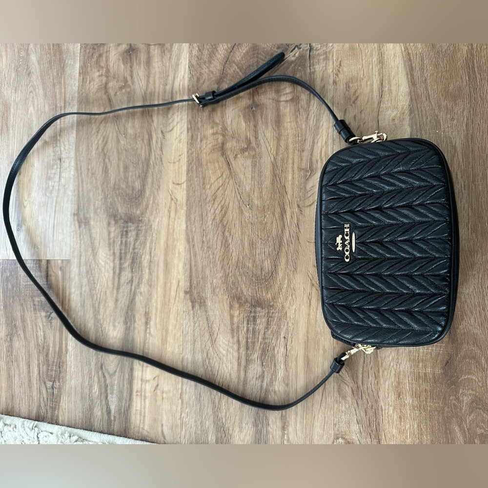 Coach cross body bag. Brand new. Never used.